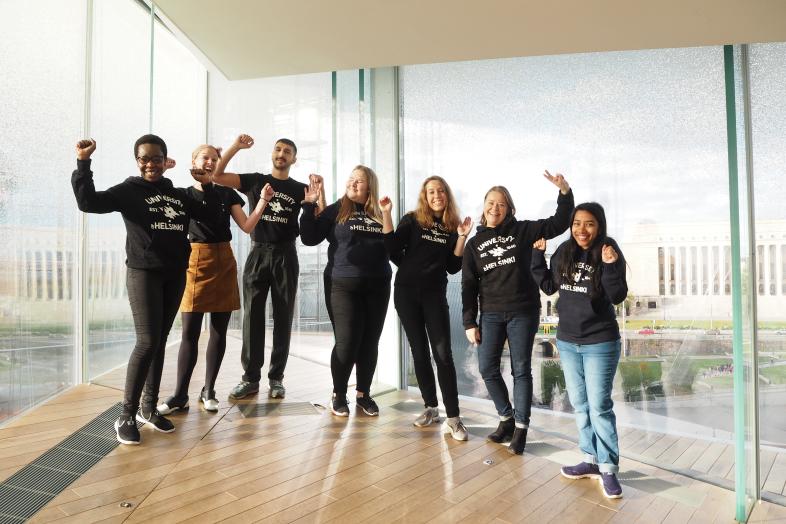 A group of happy students in Helsinki Central Library Oodi 