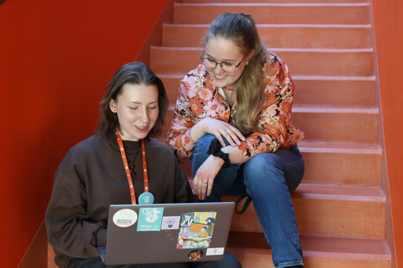 Students sitting on stairs