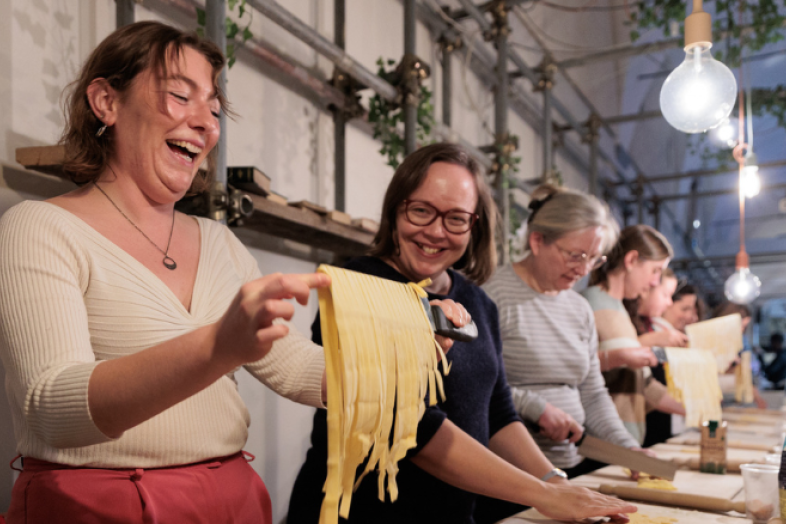 People making pasta